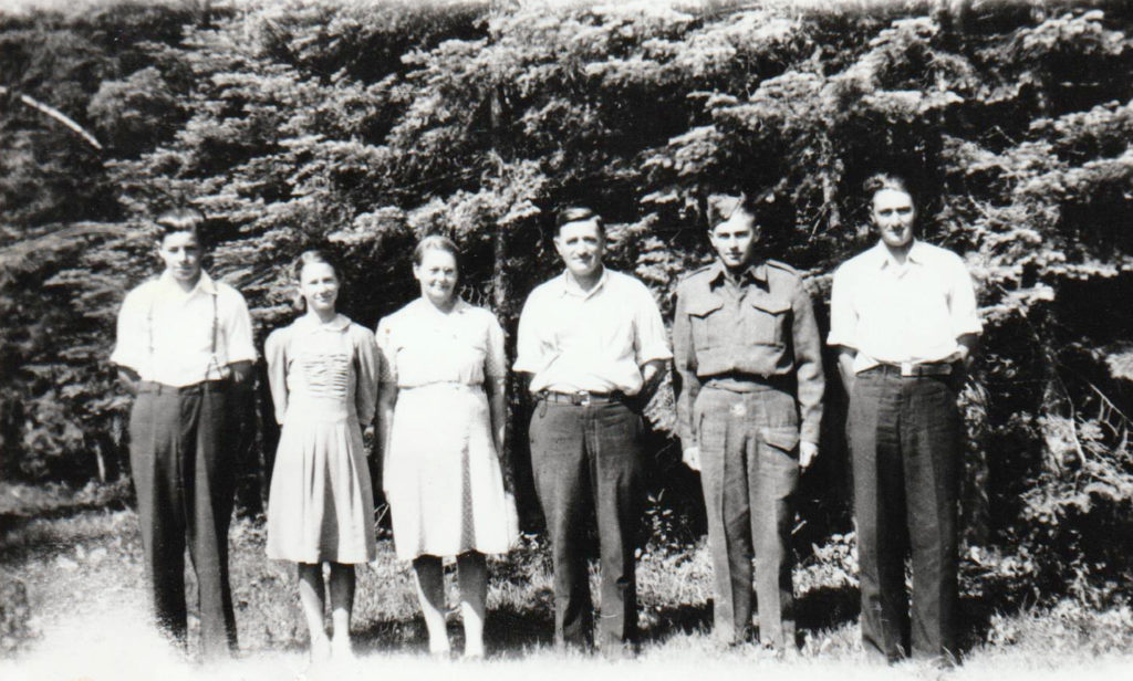 Loren and his family prior to going overseas. (Left to right) Harley, Clarice, Christina (Mother), Nels (Father), Loren and Evert.