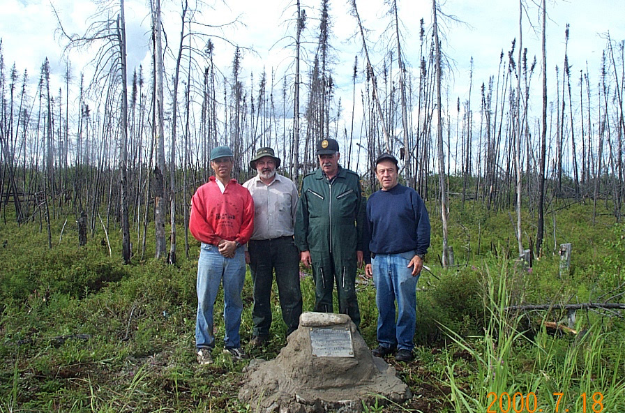 Richard Peninsula Commemoration - On the Shore of Kadeniuk Lake (Left to Right): Henri Richard (Nephew), Marcel Gauthier (Nephew), Richard Gauthier (Nephew) and Michel Richard (Brother) all relatives of Henri Richard next to the cairn that was built on site.