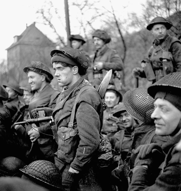 Infantrymen of the Royal Winnipeg Rifles in a Buffalo amphibious vehicle taking part in Operation VERITABLE en route from Niel to Keeken, Germany, 9 February 1945.